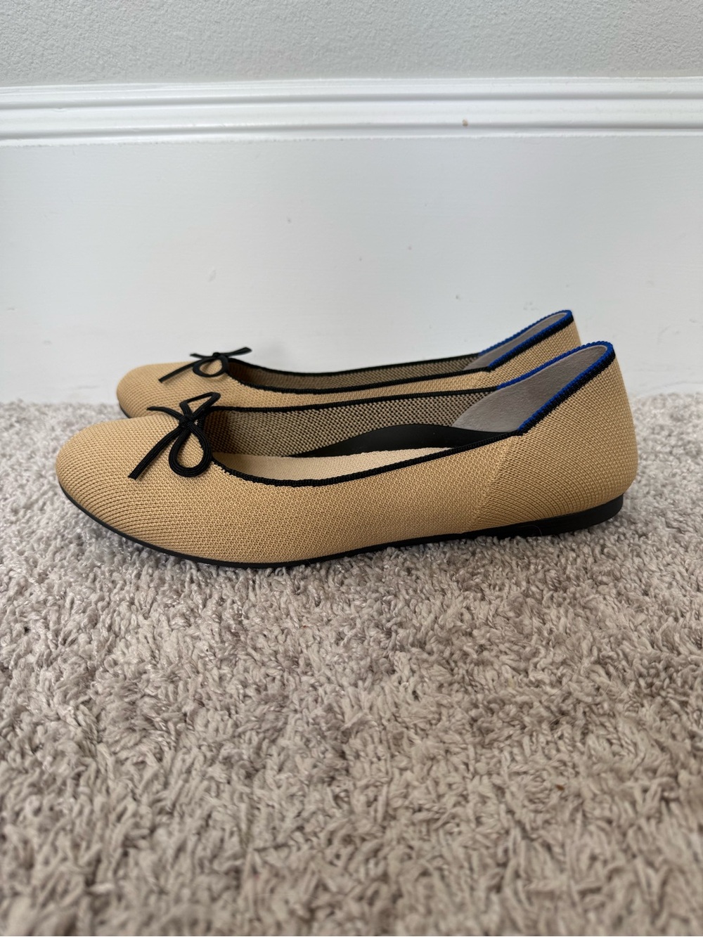 Rothy's Tan Round Toe Ballet Flats with Black Trim and Bow - Picture 4 of 11
